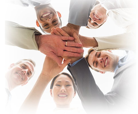 huddled people with hands in center